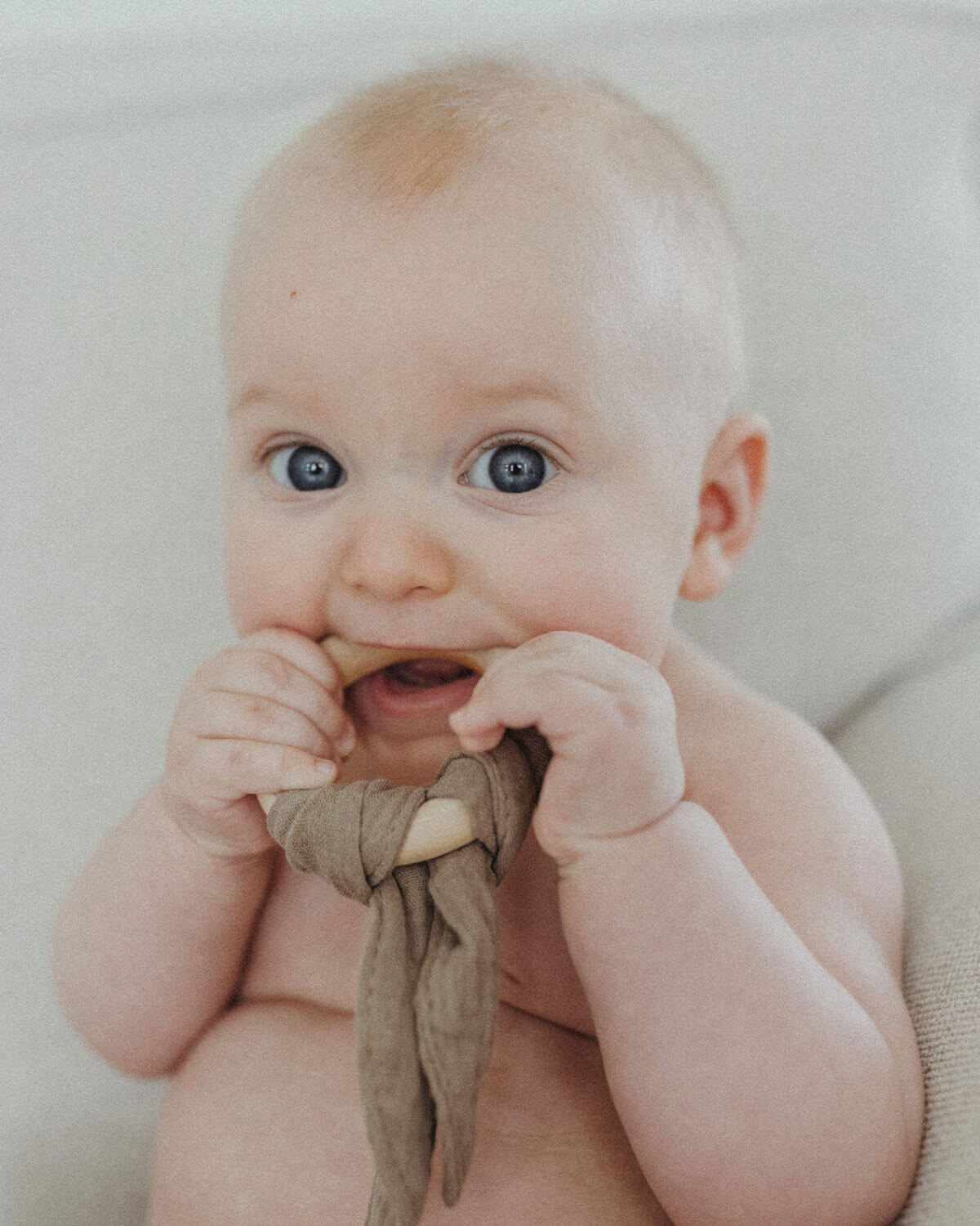 baby with bunny teethers