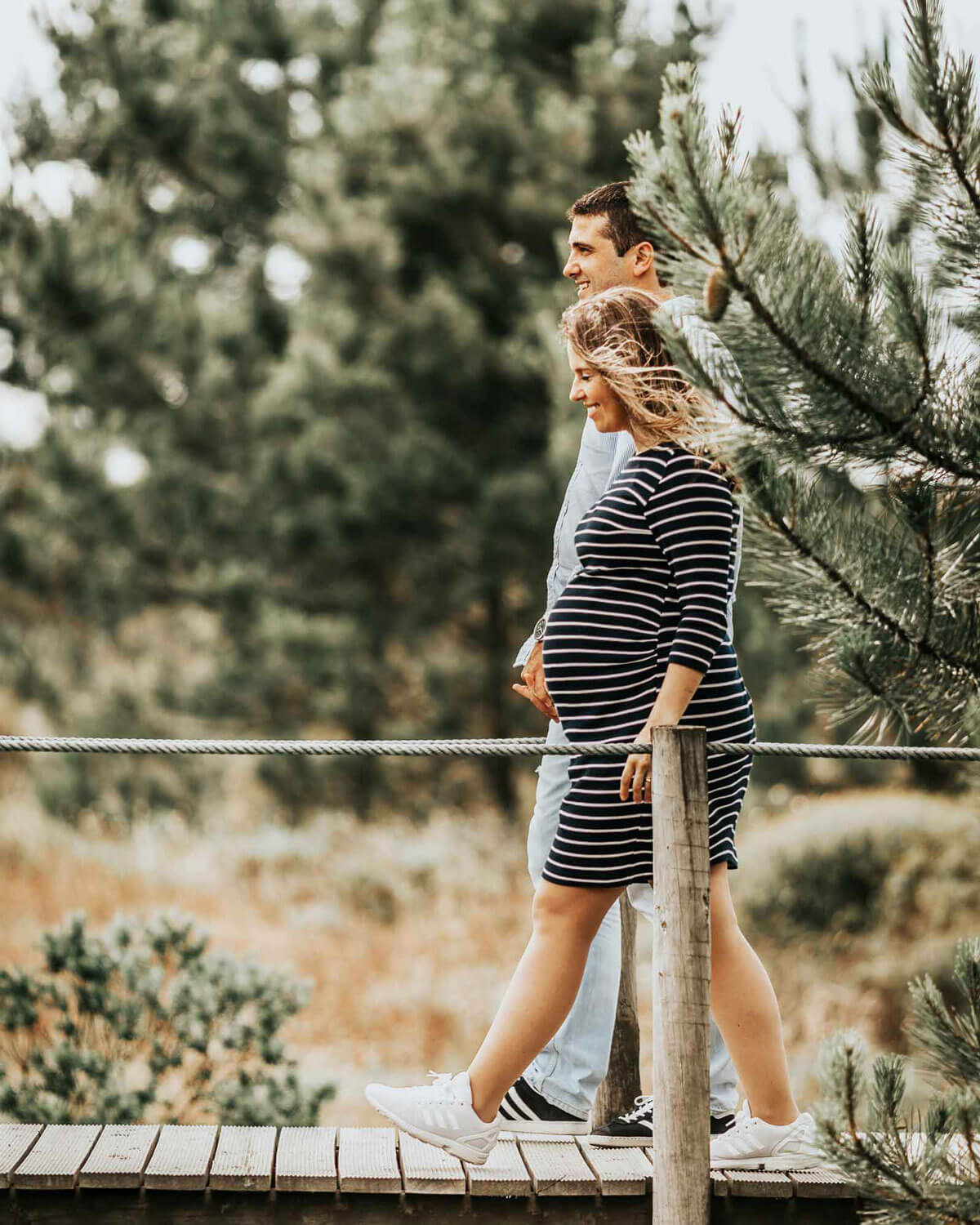 pregnant couple walking