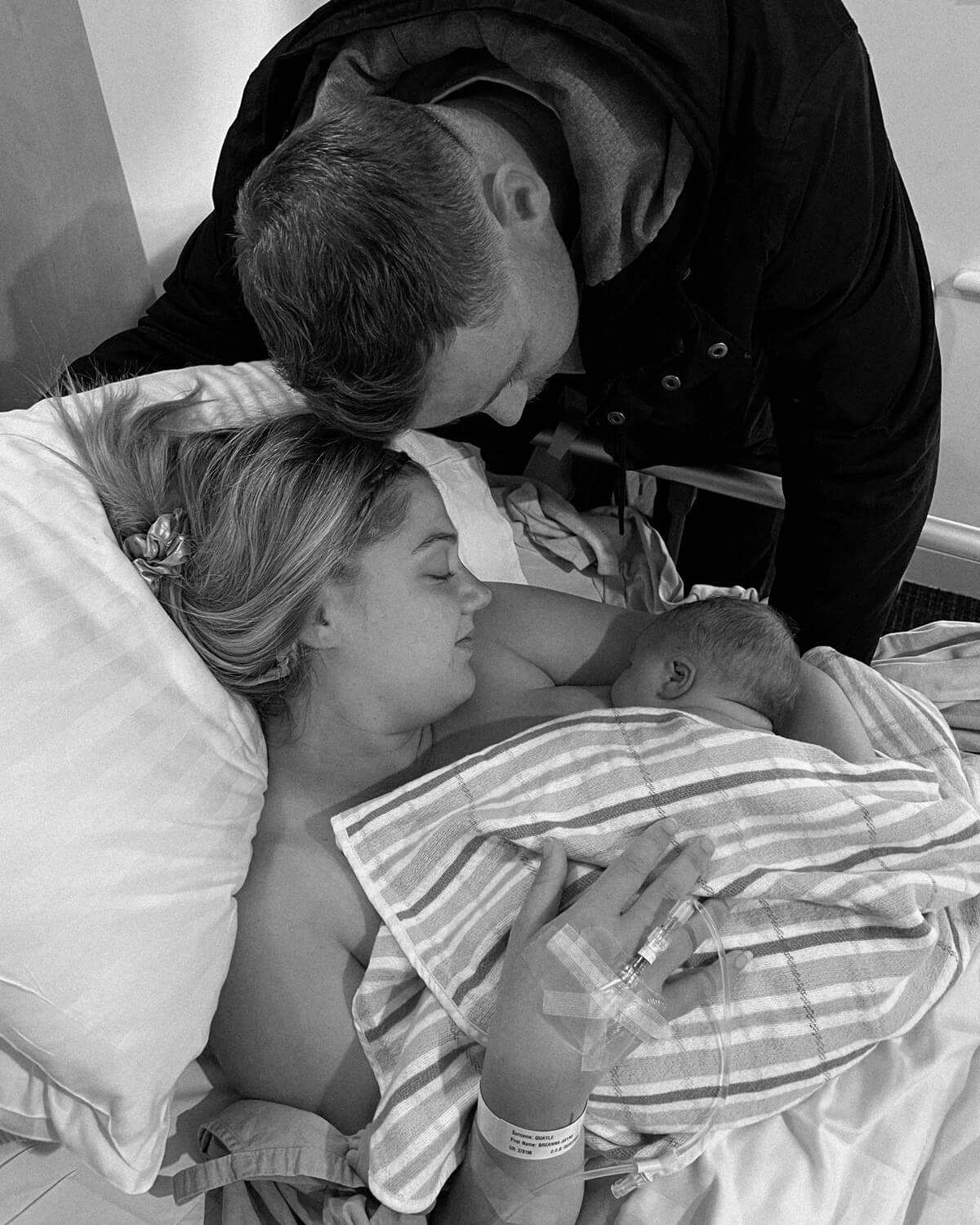 mother and father in the hospital with newbron baby