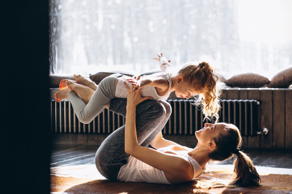 mother playing with child