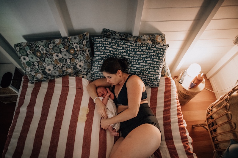 postpartum mama with baby