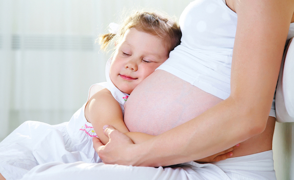 pregnant mother and child