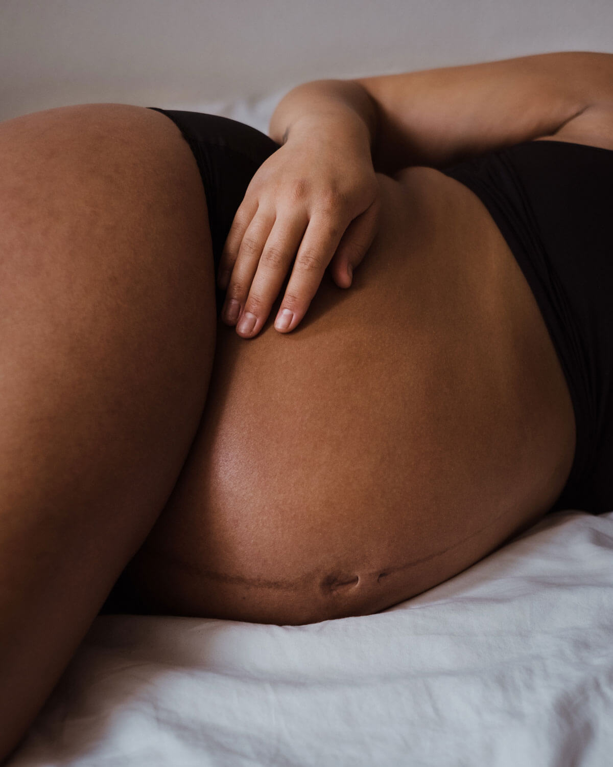 pregnant woman sleeping on the side