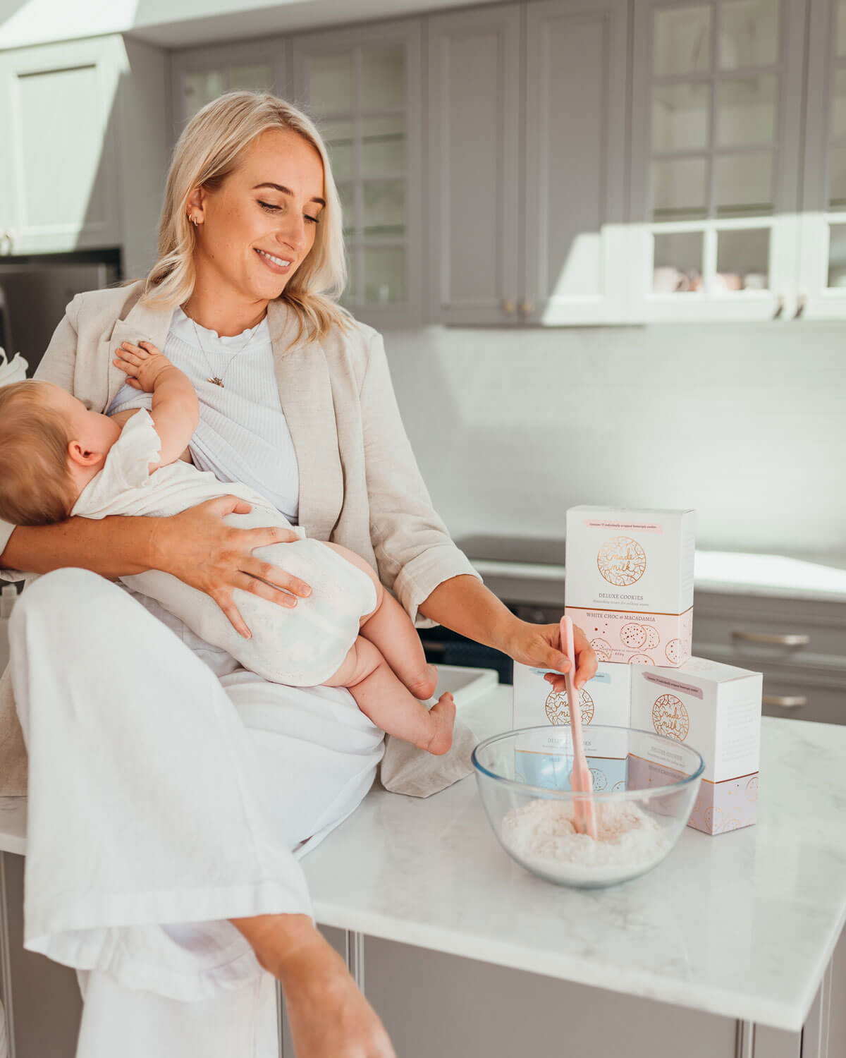 woman breastfeeding in the kitchen