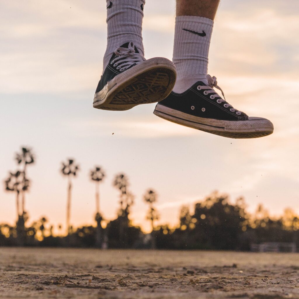 wearing low-top sneakers