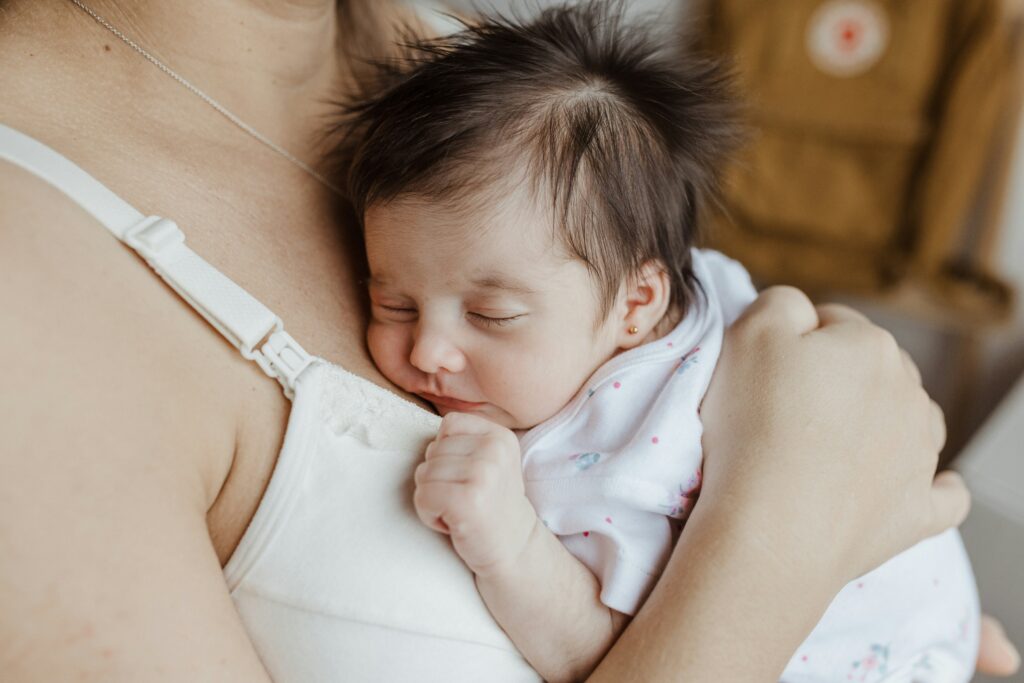 woman holding her baby